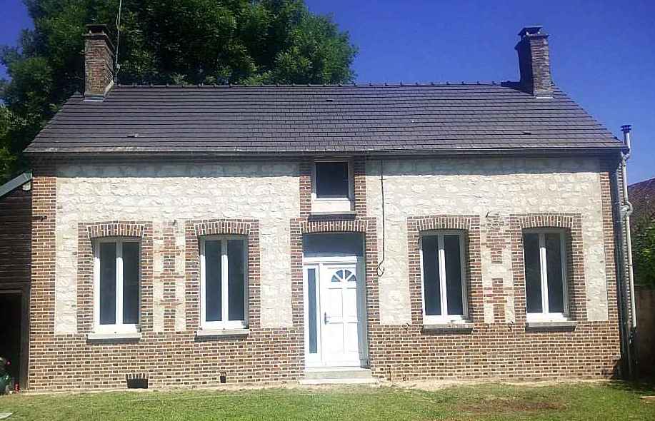 Réfection d'une façade en briques et moellons de craie